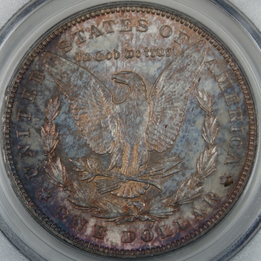 1889 PCGS MS-62 Morgan Silver Dollar Toned: 1889 PCGS MS-62 Morgan Silver Dollar Toned This is an 1889 Morgan Silver Dollar coin from the United States, certified by PCGS with a grade of MS-62. The coin features particularly attractive reverse 