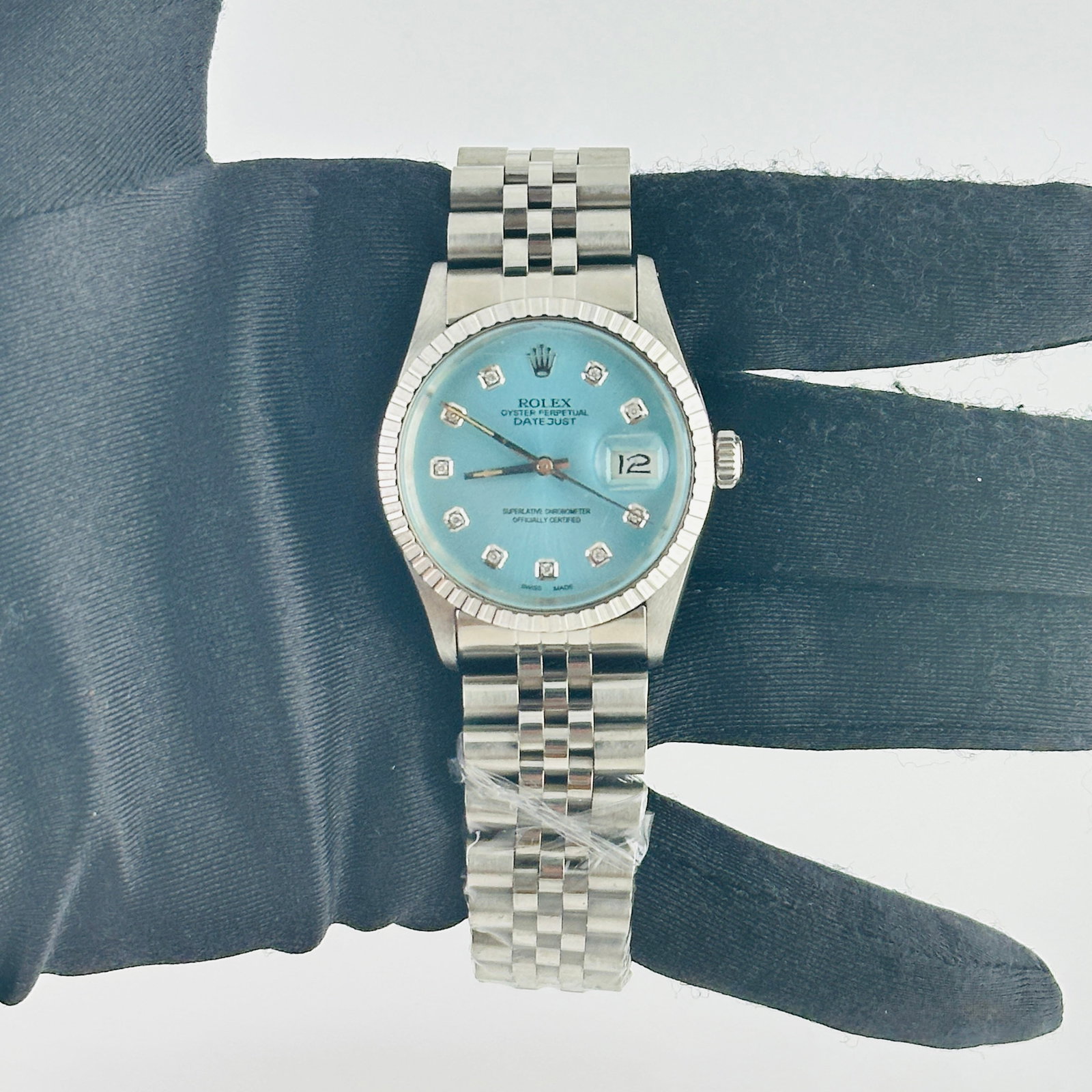Rolex Datejust aftermarket Ice Blue Diamond Dial Jubilee Bracelet Ref 16030: Rolex Datejust aftermarket Ice Blue Diamond Dial Jubilee Bracelet Ref 16030 This men's Rolex Datejust features an aftermarket ice blue diamond dial and an aftermarket Jubilee bracelet. The watch is id