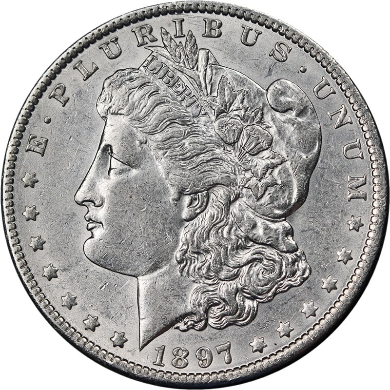 1897 O Morgan Silver Dollar Choice AU BU Bright White: 1897 O Morgan Silver Dollar Choice AU BU Bright White This 1897-O Morgan Silver Dollar features attractive eye appeal, bright white color, and a strong strike. The coin is composed of silver with a fi