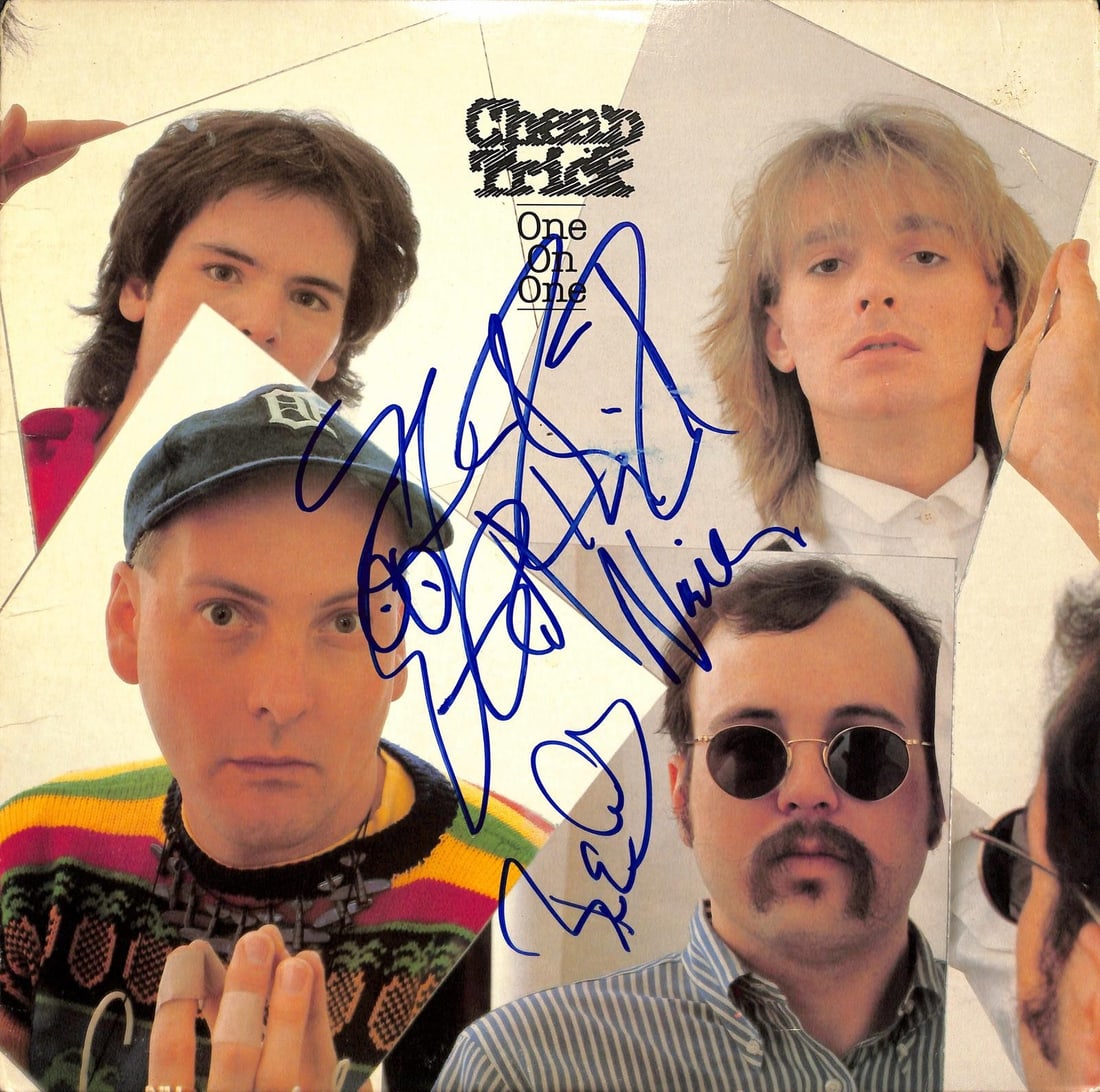 Beckett LOA autographed Cheap Trick One on One LP cover: Beckett LOA autographed Cheap Trick One on One LP cover This is a pre-owned, multi-signed copy of Cheap Trick's classic album One on One. The album cover is hand-signed by Rick Nielsen, Robin Zander, 