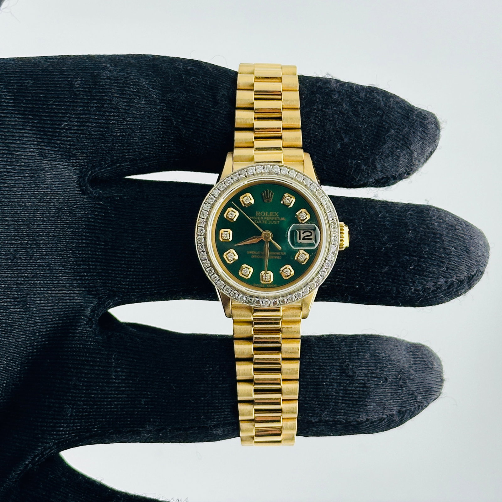 Rolex Ladies Datejust President 6517 Watch Aftermarket Green Diamond Dial and 18K Bracelet: Rolex Ladies Datejust President 6517 Watch Aftermarket Green Diamond Dial and 18K Bracelet This ladies Rolex Datejust President features an aftermarket green diamond dial, complemented by a pave diamo