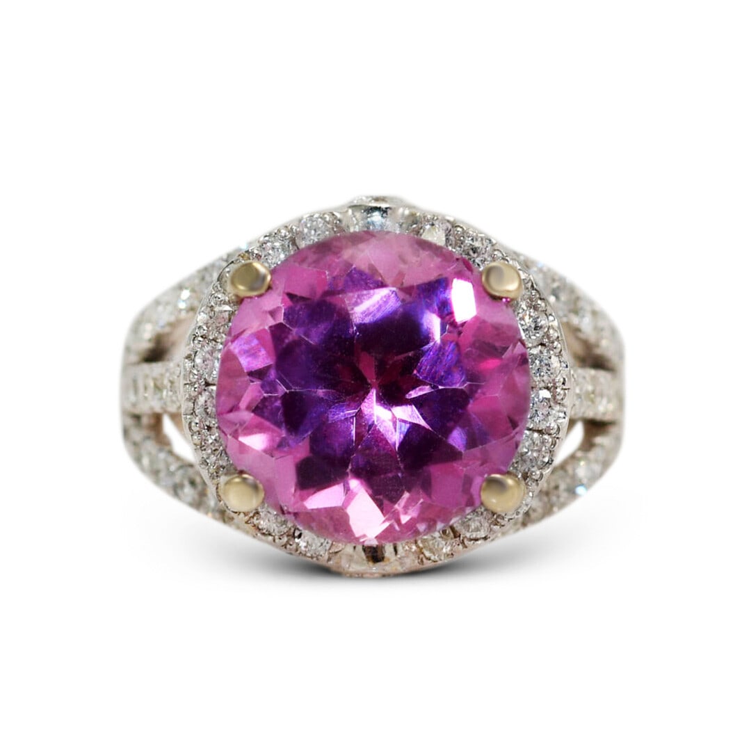 Pink Topaz Diamond Ring 14K White Gold Size 6: Pink Topaz Diamond Ring 14K White Gold Size 6 This elegant ring features a vibrant round brilliant cut pink topaz as its centerpiece, weighing 7.80 carats and measuring 12mm. Set in 14k white gold, th