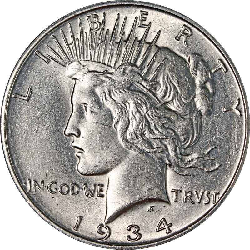 1934 Denver Mint Silver Peace Dollar Coin United States: 1934 Denver Mint Silver Peace Dollar Coin United States This is a 1934-D Peace Dollar coin from the United States, composed of 90% silver and minted in Denver. The coin is circulated and pre-owned, an