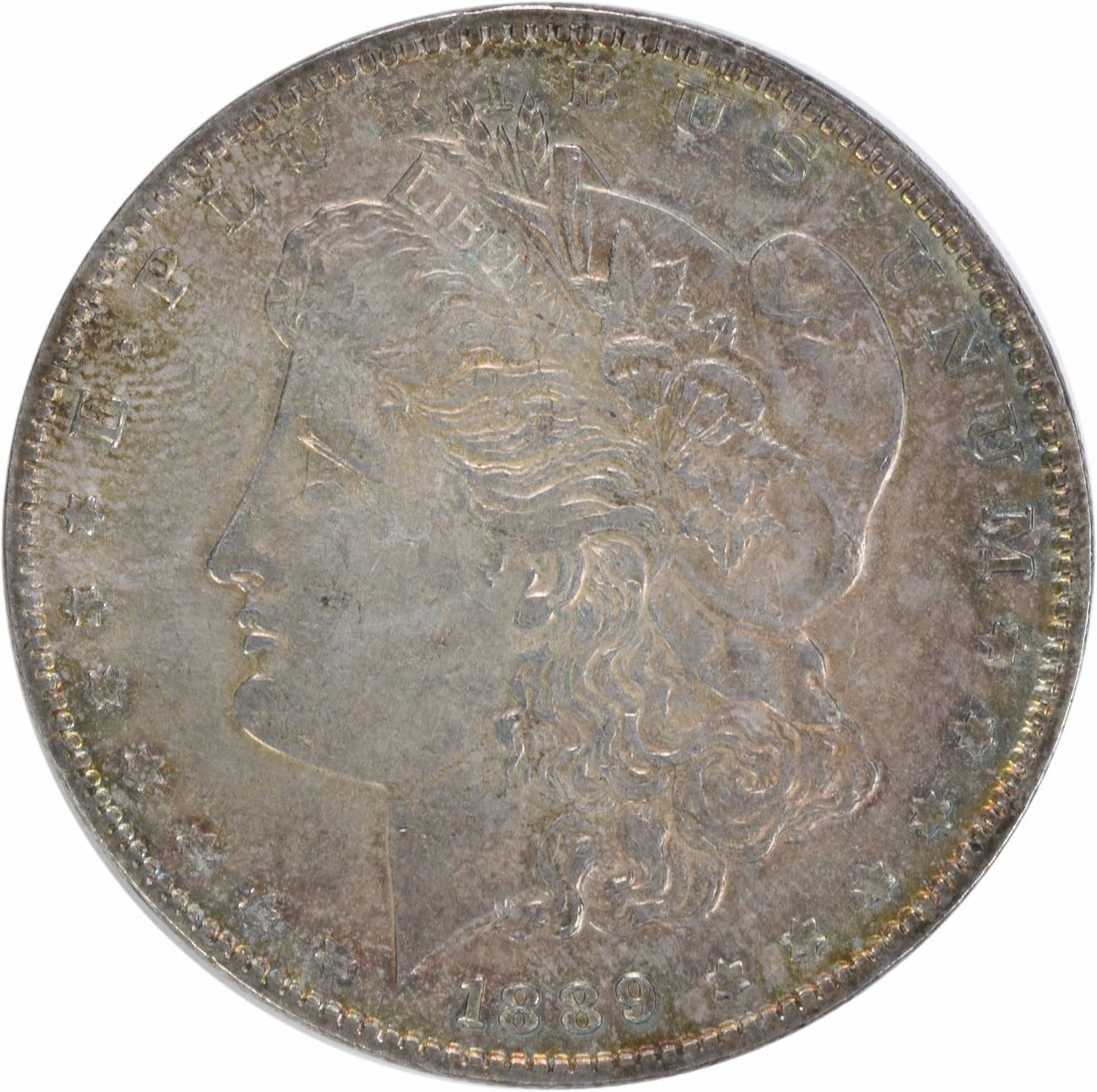 1889 Morgan Silver Dollar Uncertified 90% Silver AU Coin: 1889 Morgan Silver Dollar Uncertified 90% Silver AU Coin This 1889 "Texas" Morgan Silver Dollar features a stunning design by George T. Morgan, showcasing the classic beauty of American coinage. With 
