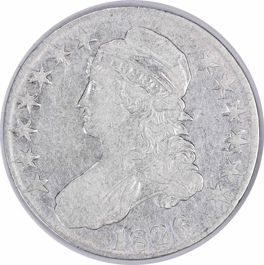 1826 Bust Half Dollar VF 50C Uncertified Philadelphia Mint John Reich Design: 1826 Bust Half Dollar VF 50C Uncertified Philadelphia Mint John Reich Design This 1826 Bust Half Dollar is a classic piece of American numismatic history, featuring a design by John Reich. The coin is