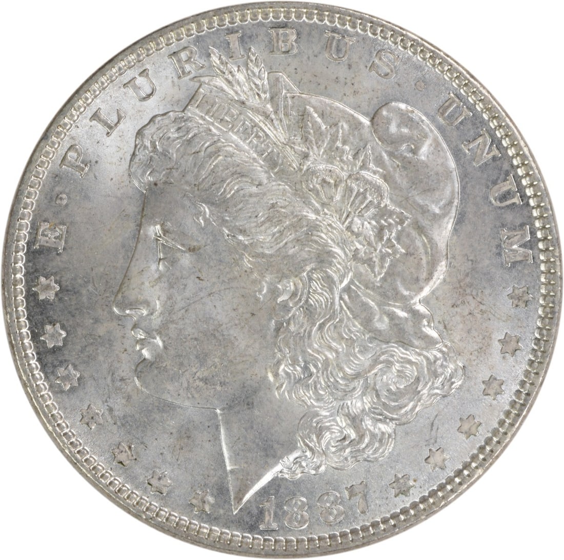 Uncirculated 1887 Silver Dollar Morgan Choice BU No Mint Mark: Uncirculated 1887 Silver Dollar Morgan Choice BU No Mint Mark This is an 1887 Morgan Silver Dollar from the United States, featuring a Choice Brilliant Uncirculated (BU) grade. The coin is composed of