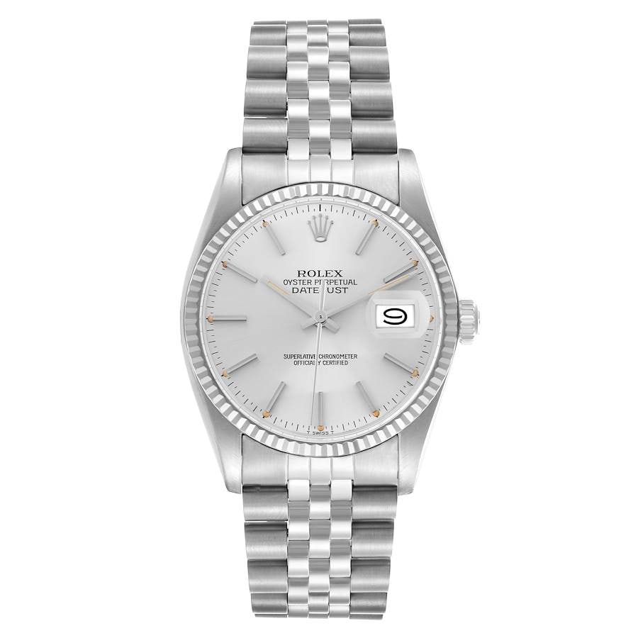 Rolex Datejust 16014 Silver Stick Dial Fluted Bezel Jubilee Bracelet: Rolex Datejust 16014 Silver Stick Dial Fluted Bezel Jubilee Bracelet This Rolex Datejust features a silver faded dial and a classic D-Link Jubilee bracelet. It is equipped with a fluted bezel and is d