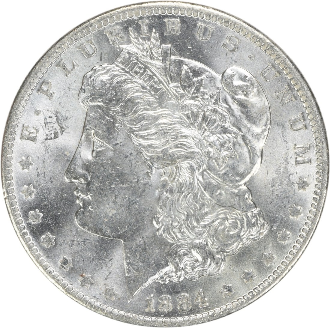 Uncirculated 1884-O Morgan Dollar Silver Coin Brilliant Uncertified: Uncirculated 1884-O Morgan Dollar Silver Coin Brilliant Uncertified This is an uncirculated 1884-O Morgan Silver Dollar from the New Orleans Mint. The coin is composed of silver and is in Brilliant Un