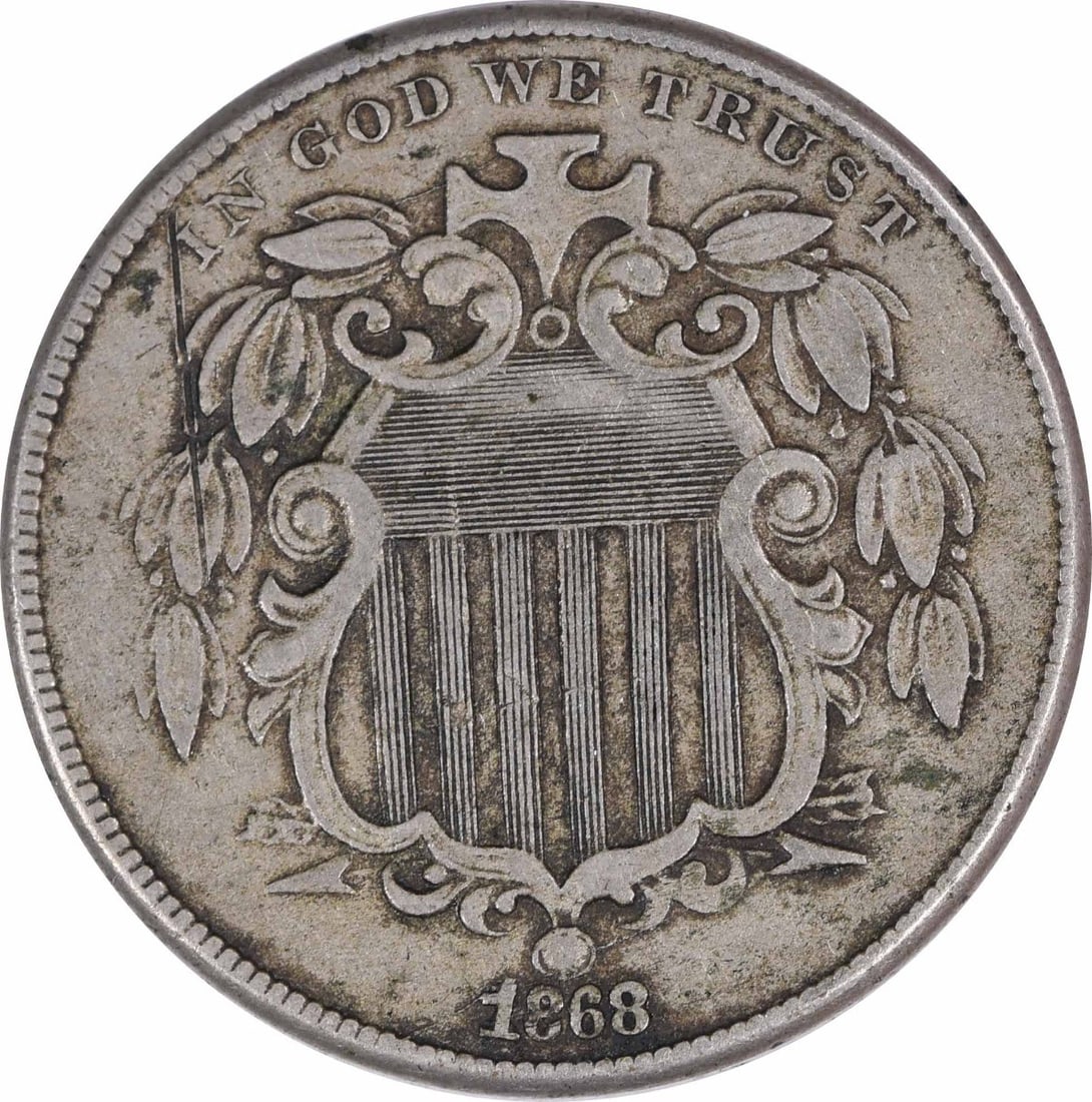 1868 Philadelphia Shield 5C Copper Nickel Coin EF Uncertified: 1868 Philadelphia Shield 5C Copper Nickel Coin EF Uncertified This 1868 Shield Nickel is a circulated coin graded as Extremely Fine (EF). It was minted in Philadelphia and designed by James Barton Lon