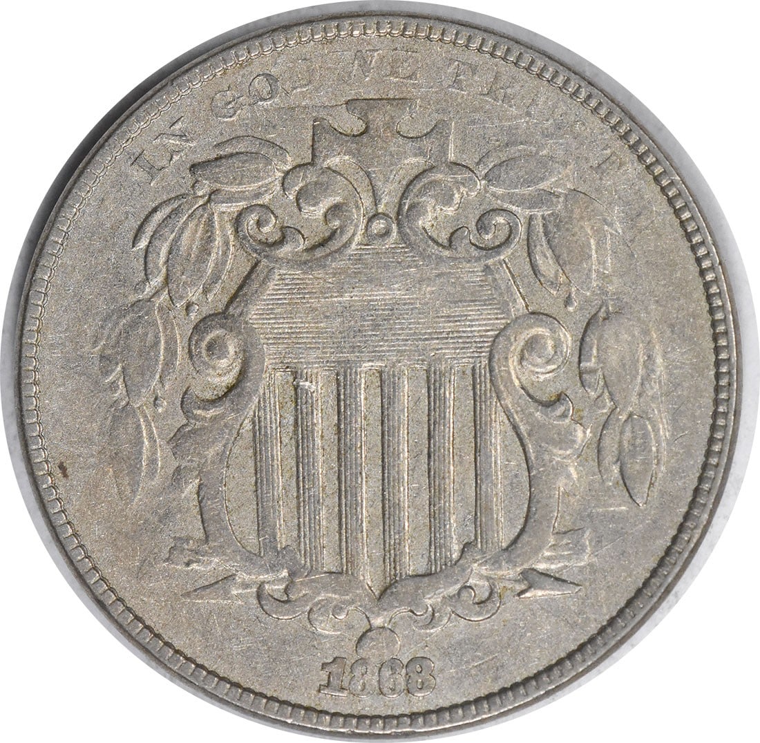 1868 Shield Nickel DDO FS-104 by Longacre Uncertified Coin: 1868 Shield Nickel DDO FS-104 by Longacre Uncertified Coin This 1868 Shield Nickel features a design by James Barton Longacre and is composed of 75% copper and 25% nickel. This particular coin is circ