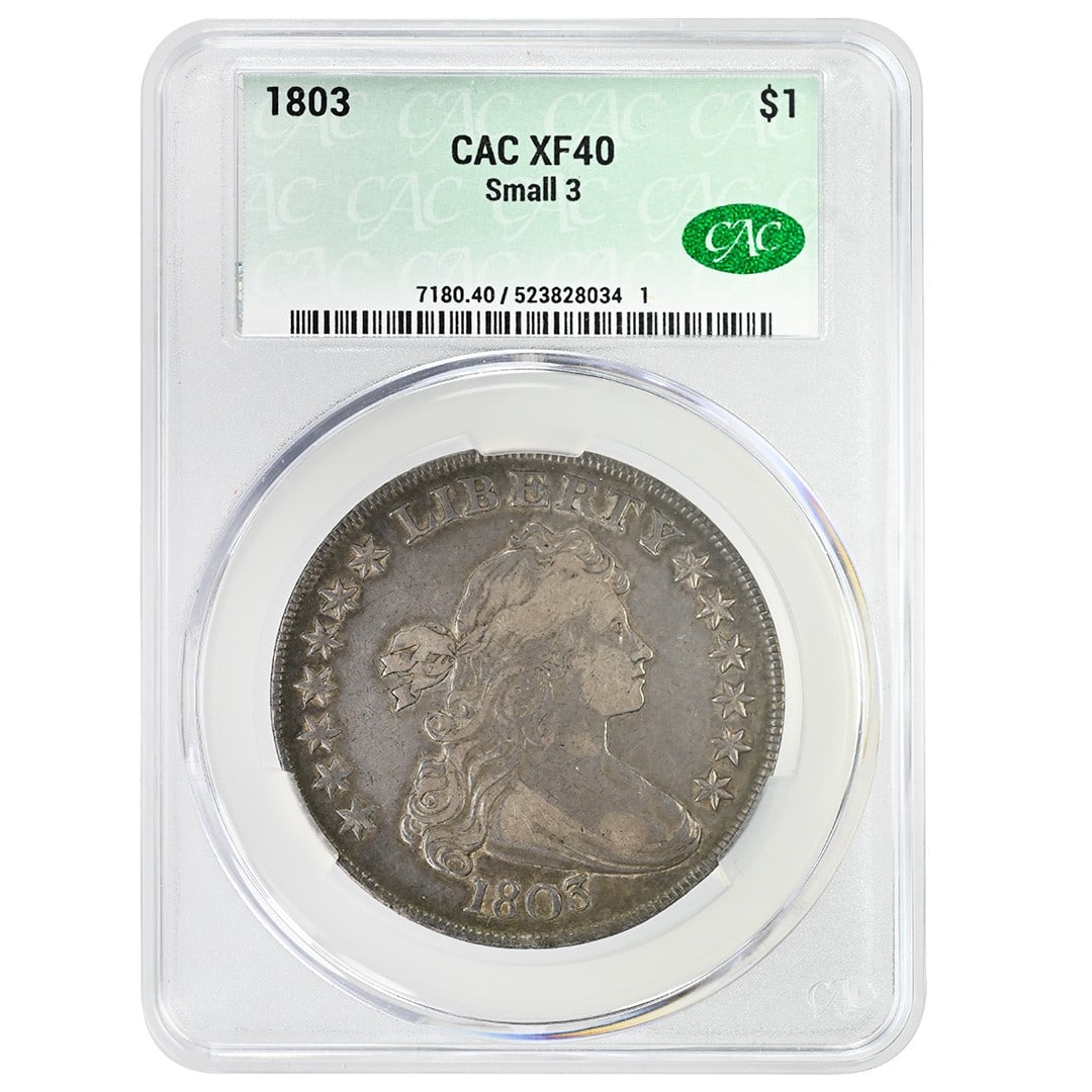 CACG XF40 1803 Draped Bust silver dollar: CACG XF40 1803 Draped Bust silver dollar This is an 1803 Draped Bust Dollar, certified by CACG with a grade of XF40. Struck in silver at the Philadelphia Mint, this circulated coin features the Type 2