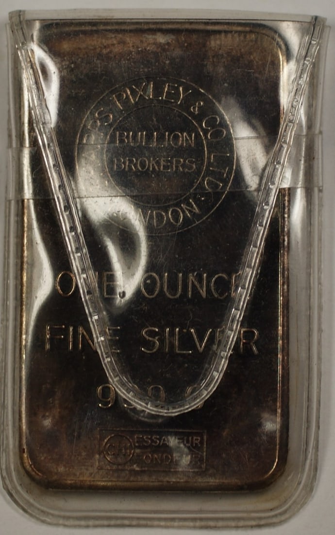 1 Troy Ounce Silver Ingot by Sharps Bixely London Bullion Brokers: 1 Troy Ounce Silver Ingot by Sharps Bixely London Bullion Brokers This is a fine 1 troy ounce silver ingot from Sharps Bixely & Co, a renowned bullion broker based in London. The ingot is uncirculated
