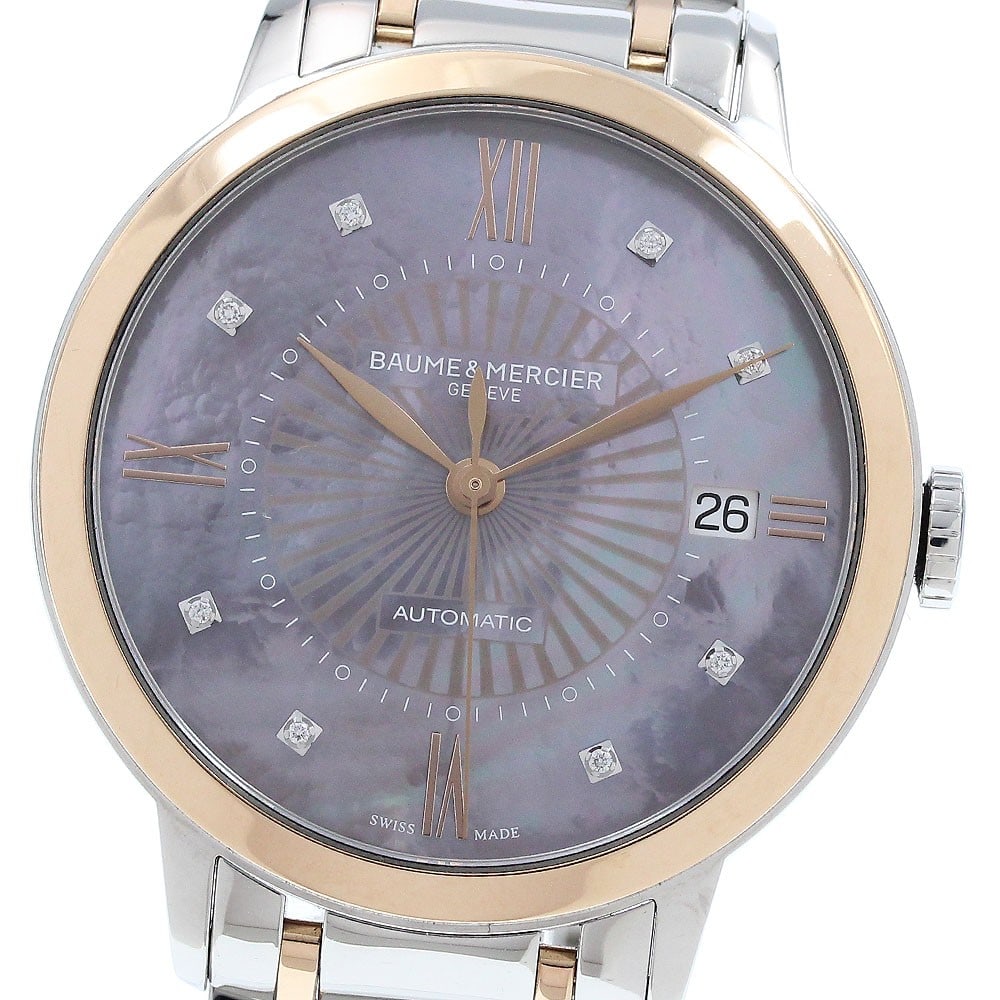 Baume and Mercier Classima 65780 Womens Automatic Wristwatch Pink Shell Diamond: Baume and Mercier Classima 65780 Womens Automatic Wristwatch Pink Shell Diamond Baume & Mercier Classima women's wristwatch with an automatic movement, pink shell dial, and PG bezel. The watch is desc
