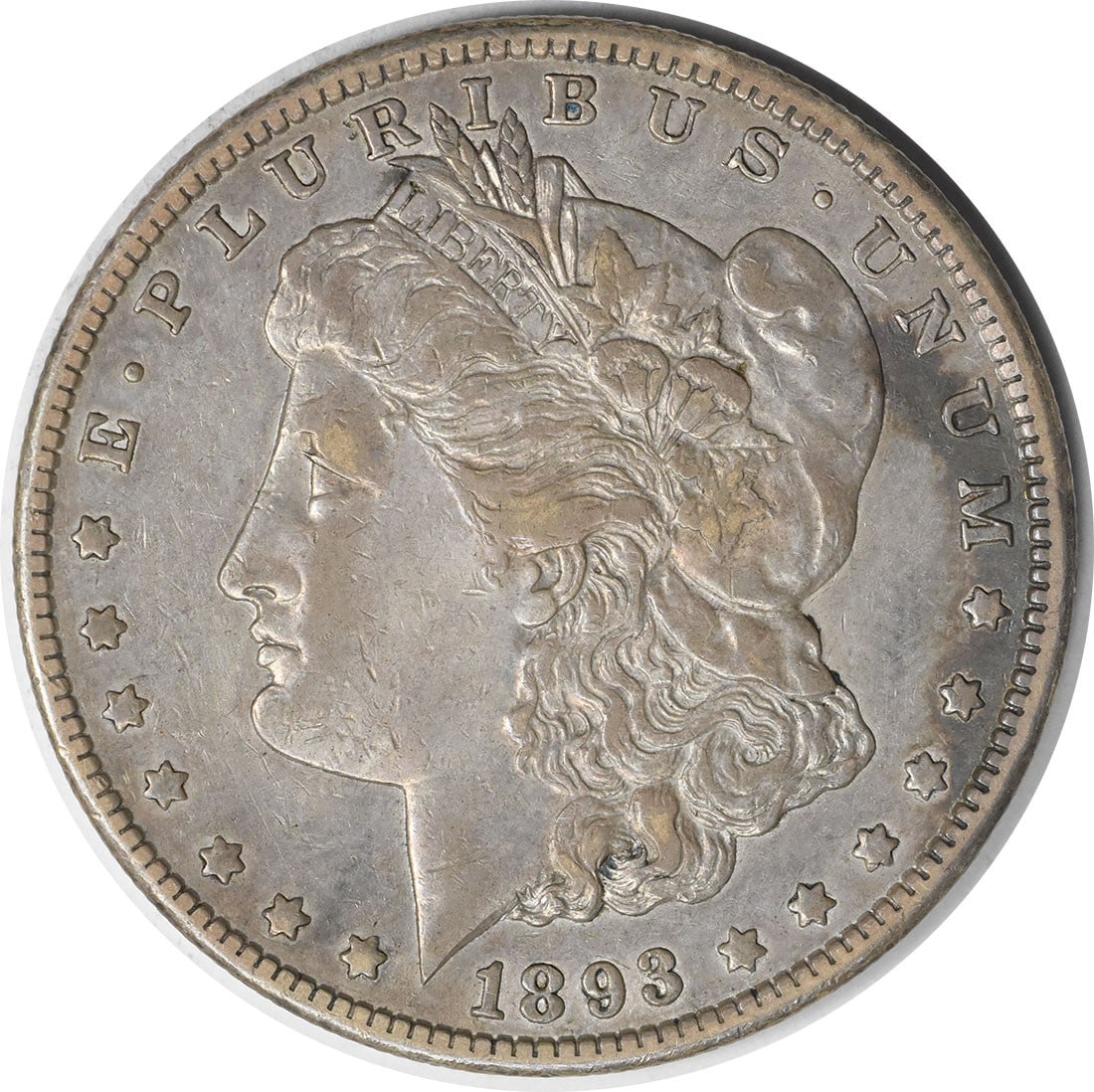 1893 CC Carson City Morgan silver dollar uncertified EF: 1893 CC Carson City Morgan silver dollar uncertified EF This is an 1893-CC Morgan Silver Dollar from the Carson City Mint. The coin is composed of 90% silver and 10% copper, features a reeded edge, an