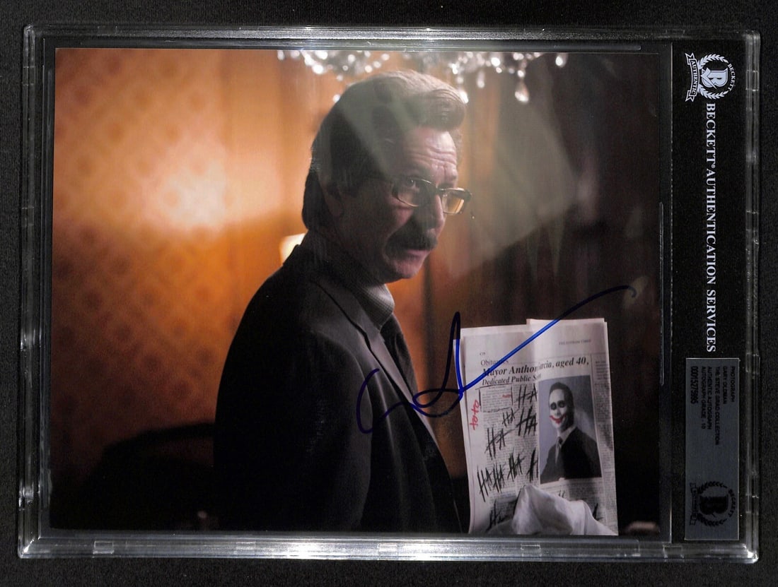 Gary Oldman Signed 8x10 Photo The Dark Knight BAS 10: Gary Oldman Signed 8x10 Photo The Dark Knight BAS 10 This stunning autographed 8x10 color photograph features Gary Oldman as Commissioner Gordon in The Dark Knight. The signature is rendered in blue p