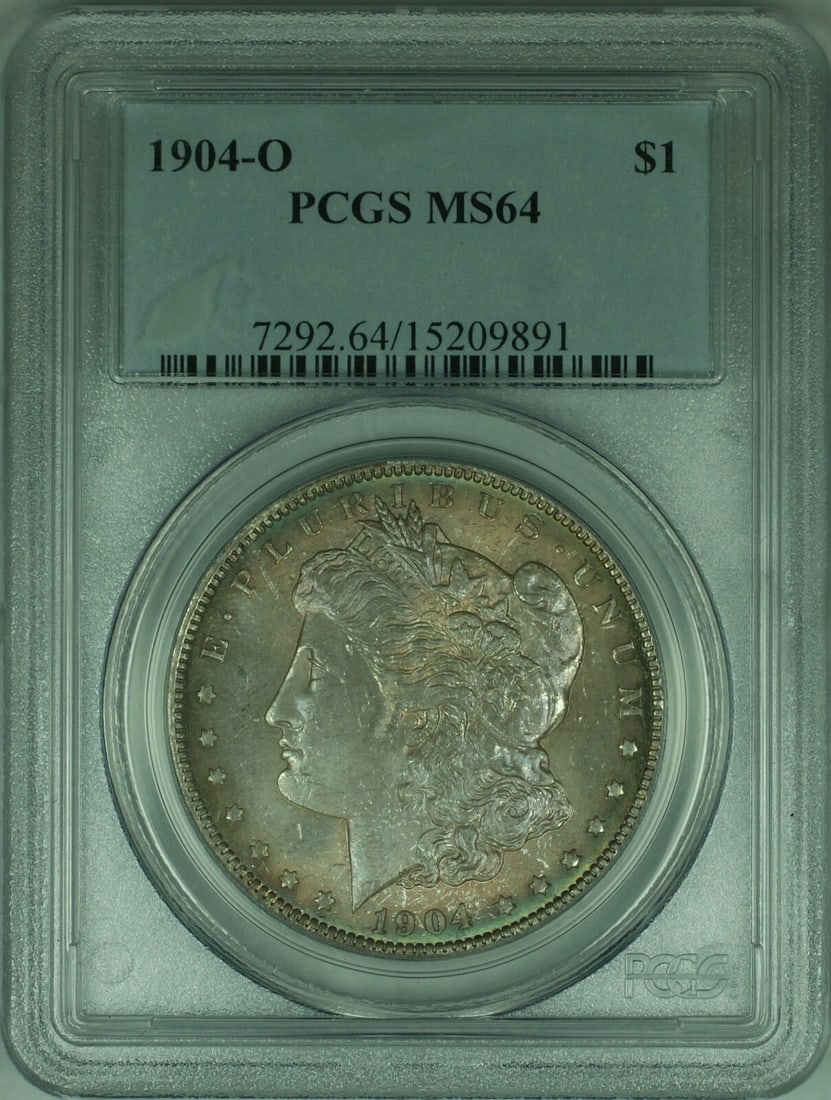 PCGS MS-64 1904-O Morgan Dollar Silver Coin with Dark Purple Toning: PCGS MS-64 1904-O Morgan Dollar Silver Coin with Dark Purple Toning This 1904-O Morgan Silver Dollar is graded MS-64 by PCGS and features striking dark purple toning. Minted in New Orleans, this uncir