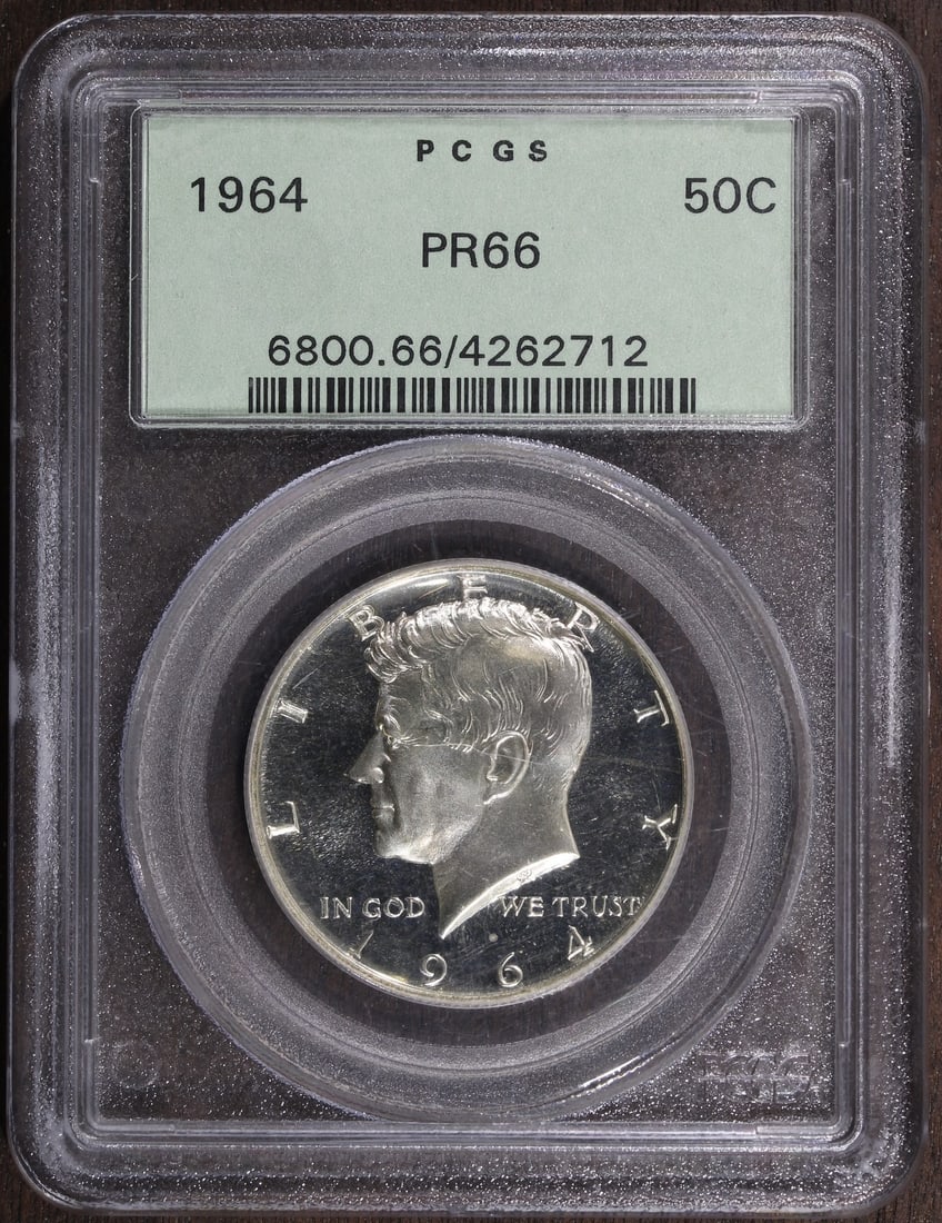 PCGS OGH 1964 Kennedy Half Dollar Proof PR66 50C Silver: PCGS OGH 1964 Kennedy Half Dollar Proof PR66 50C Silver 1964 Kennedy Half Dollar 50C in Proof strike, graded PR66 by PCGS and housed in an OGH holder. The coin is silver with 0.9 fineness and was mint