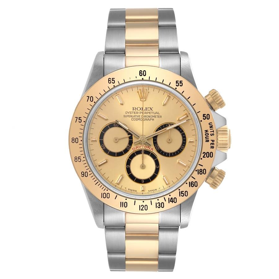 Rolex Daytona Ref 16523 Oyster Watch with Champagne Dial and Papers 1996: Rolex Daytona Ref 16523 Oyster Watch with Champagne Dial and Papers 1996 This Rolex Daytona watch features a champagne dial and a fixed bezel, paired with an Oyster bracelet. The timepiece is from the