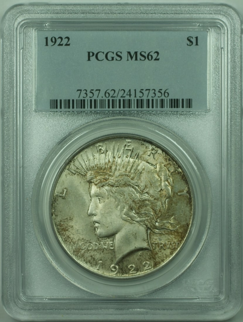 1922 Peace Dollar Silver $1 PCGS MS62 Certified Light Tone: 1922 Peace Dollar Silver $1 PCGS MS62 Certified Light Tone This 1922 Peace Silver Dollar coin from the United States is certified by PCGS with a grade of MS-62. It features a lightly toned appearance 