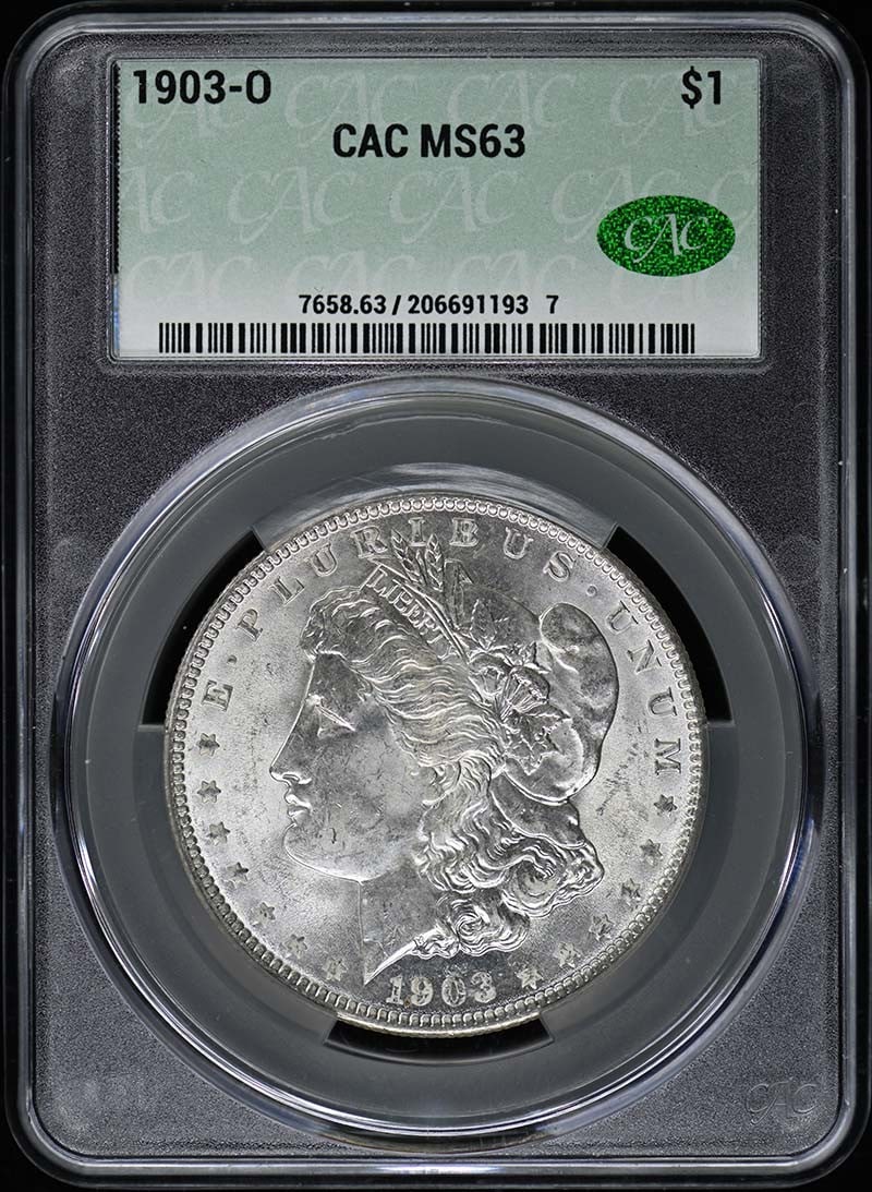 1903-O Morgan Dollar CACG MS63 Uncirculated New Orleans: 1903-O Morgan Dollar CACG MS63 Uncirculated New Orleans This 1903-O Morgan Dollar is in uncirculated condition and has been graded MS63 by CACG. It features the classic design of the Morgan Dollar, mi