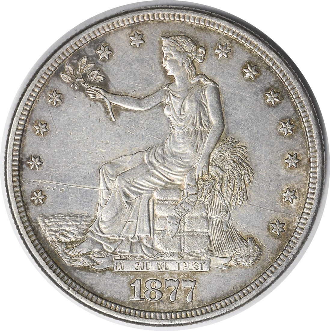 1877-S Trade Silver Dollar AU Uncertified by William Barber: 1877-S Trade Silver Dollar AU Uncertified by William Barber This 1877-S Trade Silver Dollar is a remarkable collectible, featuring a design by William Barber. With a composition of 90% silver and 10% 