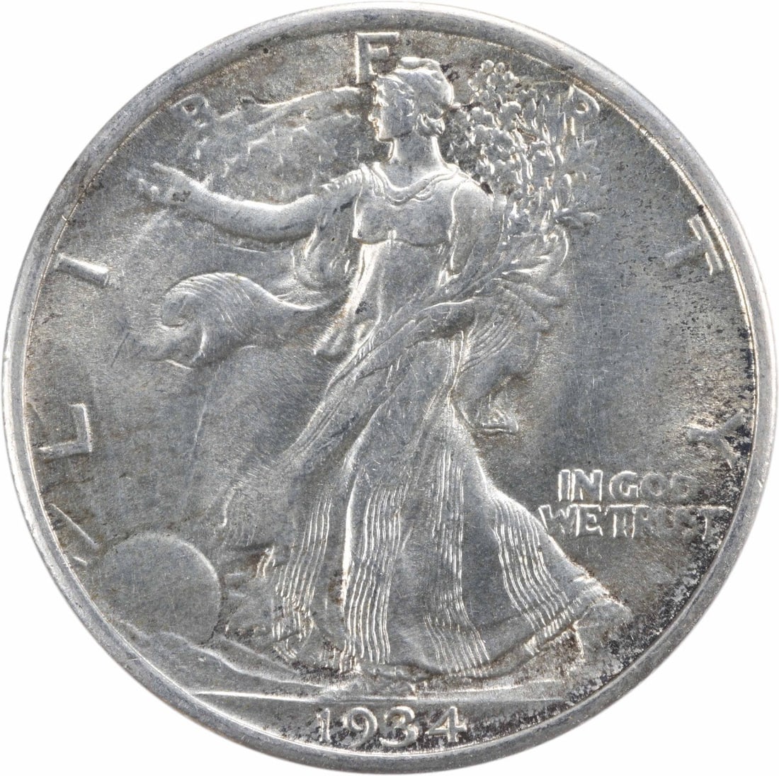 1934 Liberty Walking Half Dollar Choice BU Uncertified Silver Coin: 1934 Liberty Walking Half Dollar Choice BU Uncertified Silver Coin This is a 1934 Walking Liberty Silver Half Dollar featuring the iconic Walking Liberty design. The coin is uncirculated and graded as