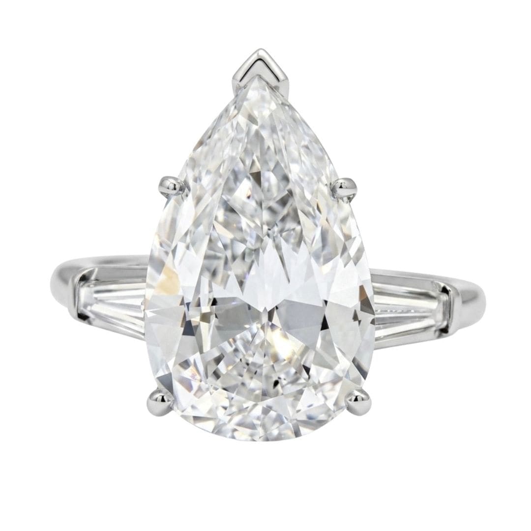 GIA Certified Platinum Pear Diamond Ring 6.73ct SI2 D Size 7.75: GIA Certified Platinum Pear Diamond Ring 6.73ct SI2 D Size 7.75 This platinum ring features a GIA certified pear shape diamond weighing 6.73 carats, graded D color and SI2 clarity. The center diamond 