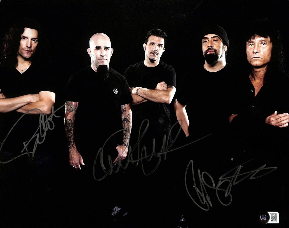 Anthrax Band Signed 11x14 Photo by Benante Caggiano Bello Beckett LOA: Anthrax Band Signed 11x14 Photo by Benante Caggiano Bello Beckett LOA This is an authentic 11x14 autographed photograph featuring three members of the iconic metal band Anthrax: Charlie Benante, Rob C