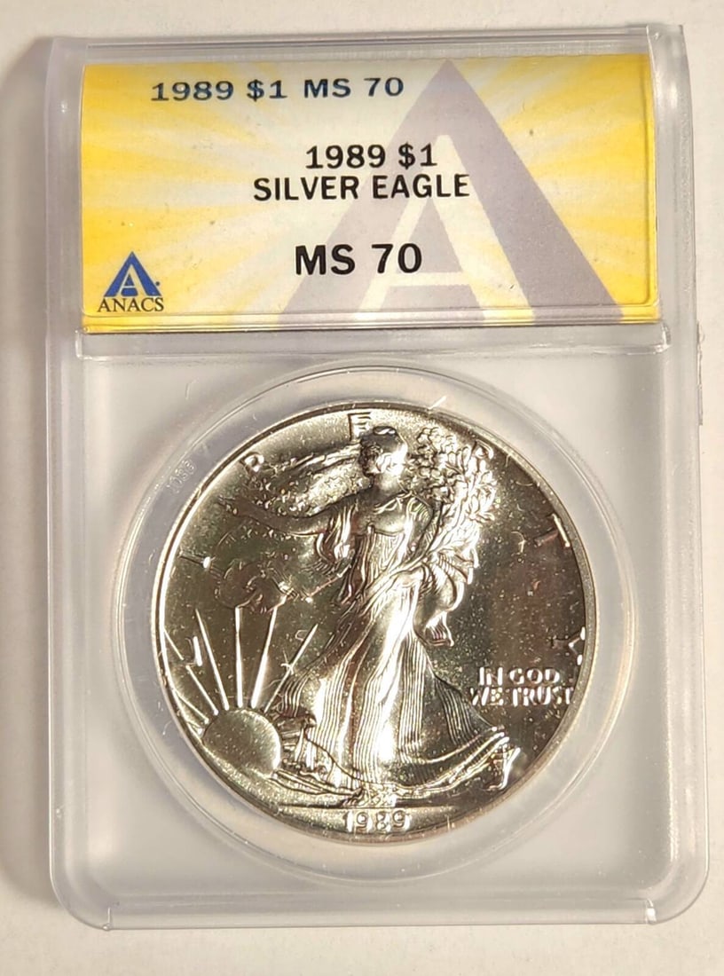 1989 P Silver Eagle Coin ANACS MS-70 Uncirculated USA: 1989 P Silver Eagle Coin ANACS MS-70 Uncirculated USA This 1989 Silver Eagle coin is certified by ANACS with a remarkable MS-70 grade, indicating it is in pristine, uncirculated condition. Struck at t