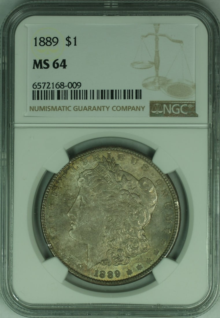 NGC MS64 1889 Philadelphia Morgan Dollar Silver Coin with Toning: NGC MS64 1889 Philadelphia Morgan Dollar Silver Coin with Toning This 1889 Morgan Silver Dollar features natural toning and has been certified by NGC with a grade of MS-64. Struck at the Philadelphia 