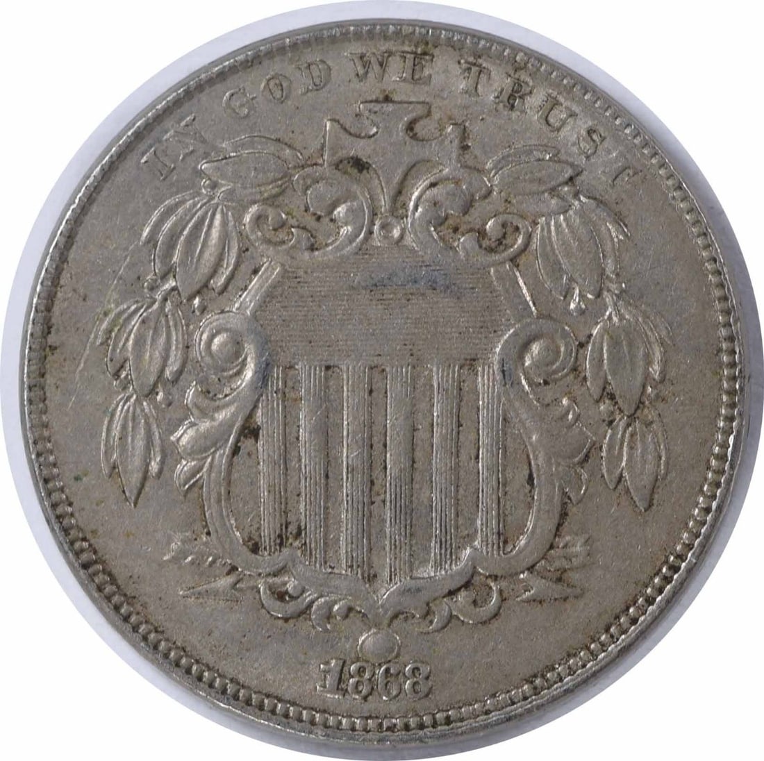 1868 Philadelphia Shield 5C Copper Nickel Coin AU Uncertified: 1868 Philadelphia Shield 5C Copper Nickel Coin AU Uncertified This 1868 Shield Nickel is an attractive example of early American coinage. Graded as About Uncirculated (AU), this circulated coin was mi