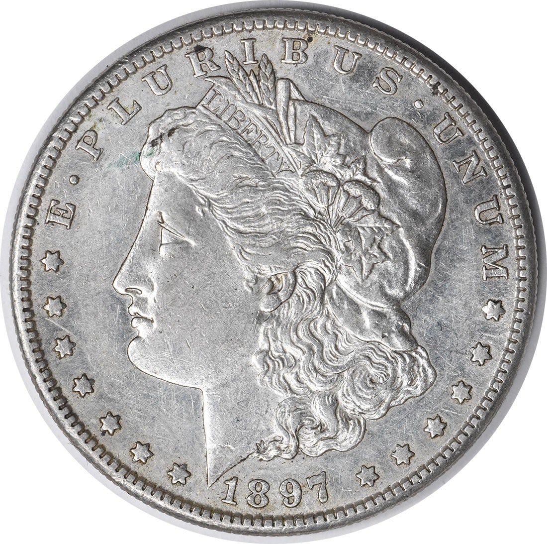 1897-S Morgan Silver Dollar AU Uncertified San Francisco Mint: 1897-S Morgan Silver Dollar AU Uncertified San Francisco Mint This 1897-S Morgan Silver Dollar showcases a beautiful design by George T. Morgan, featuring a classic representation of Lady Liberty and 