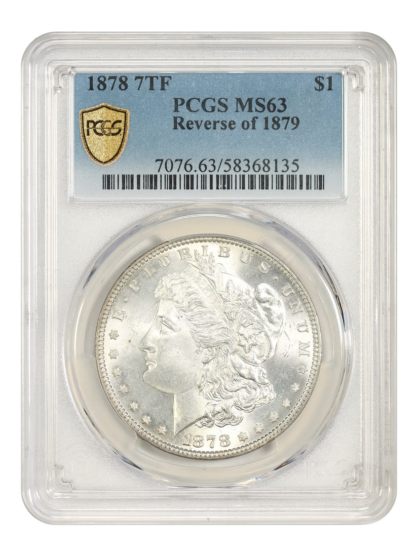 PCGS MS63 1878 Morgan Dollar $1 7TF Reverse of 1879: PCGS MS63 1878 Morgan Dollar $1 7TF Reverse of 1879 1878 Morgan Dollar $1, 7TF Reverse of 1879, graded PCGS MS63. This uncirculated pre-owned coin was minted in Philadelphia and includes certification