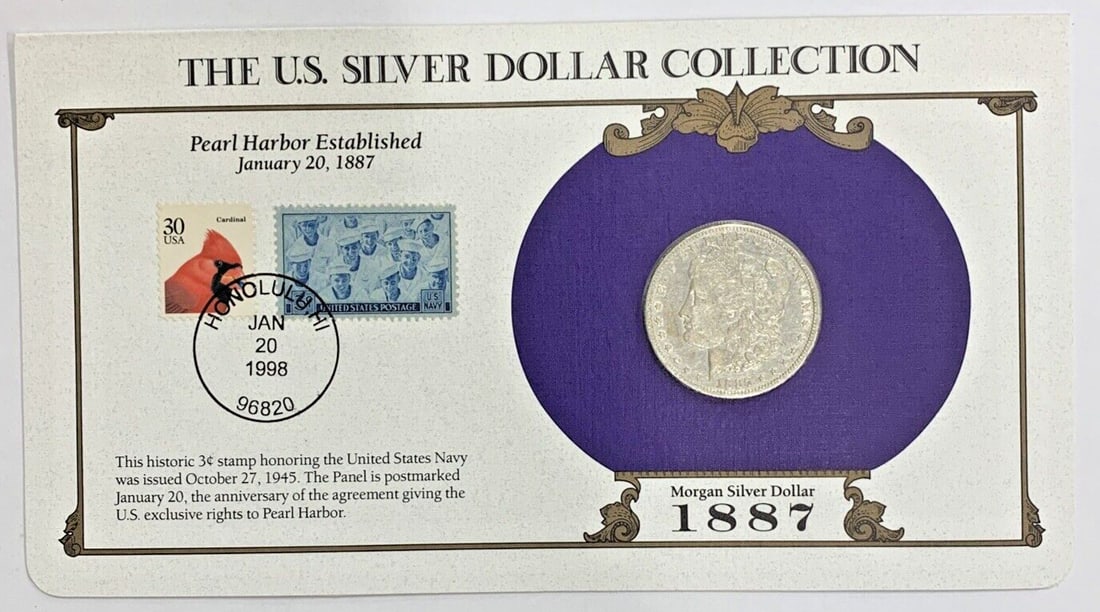 1887-O Morgan Dollar Silver Coin with Commemorative Stamp Card: 1887-O Morgan Dollar Silver Coin with Commemorative Stamp Card This 1887-O Morgan Silver Dollar is a circulated coin from the New Orleans Mint, presented as part of a collection with a commemorative s