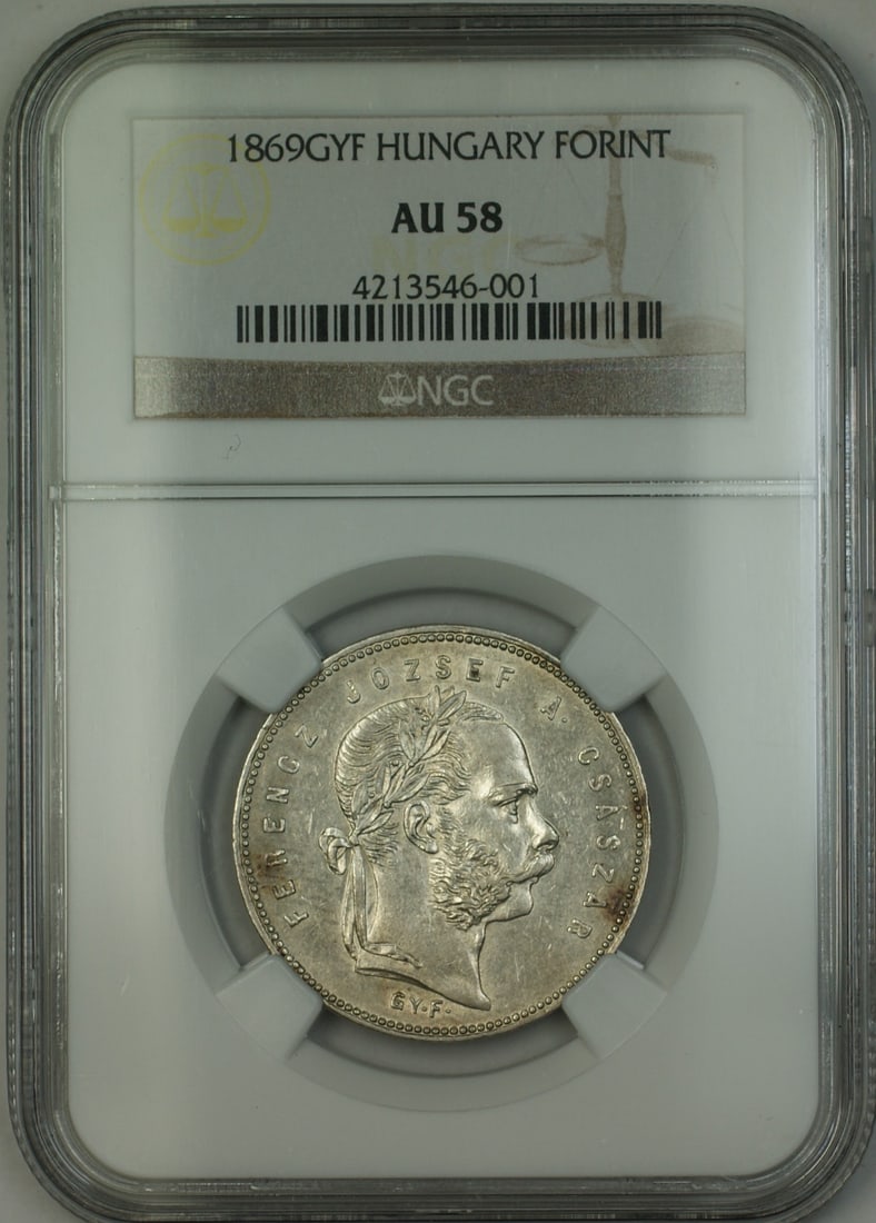 Hungary 1869 Silver Forint NGC Certified AU 58 Coin: Hungary 1869 Silver Forint NGC Certified AU 58 Coin This 1869-GYF Hungary silver forint coin is graded AU-58 by NGC. Made of silver, it is a circulated coin from Hungary dating to the year 1869. The c