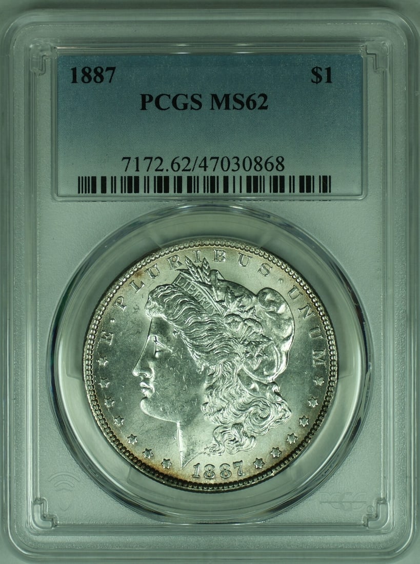 PCGS MS62 1887 Morgan Dollar Silver Coin from Philadelphia Mint: PCGS MS62 1887 Morgan Dollar Silver Coin from Philadelphia Mint This 1887 Morgan Silver Dollar coin, minted in Philadelphia, features a composition of 90% silver. Graded MS-62 by PCGS, it is classifie
