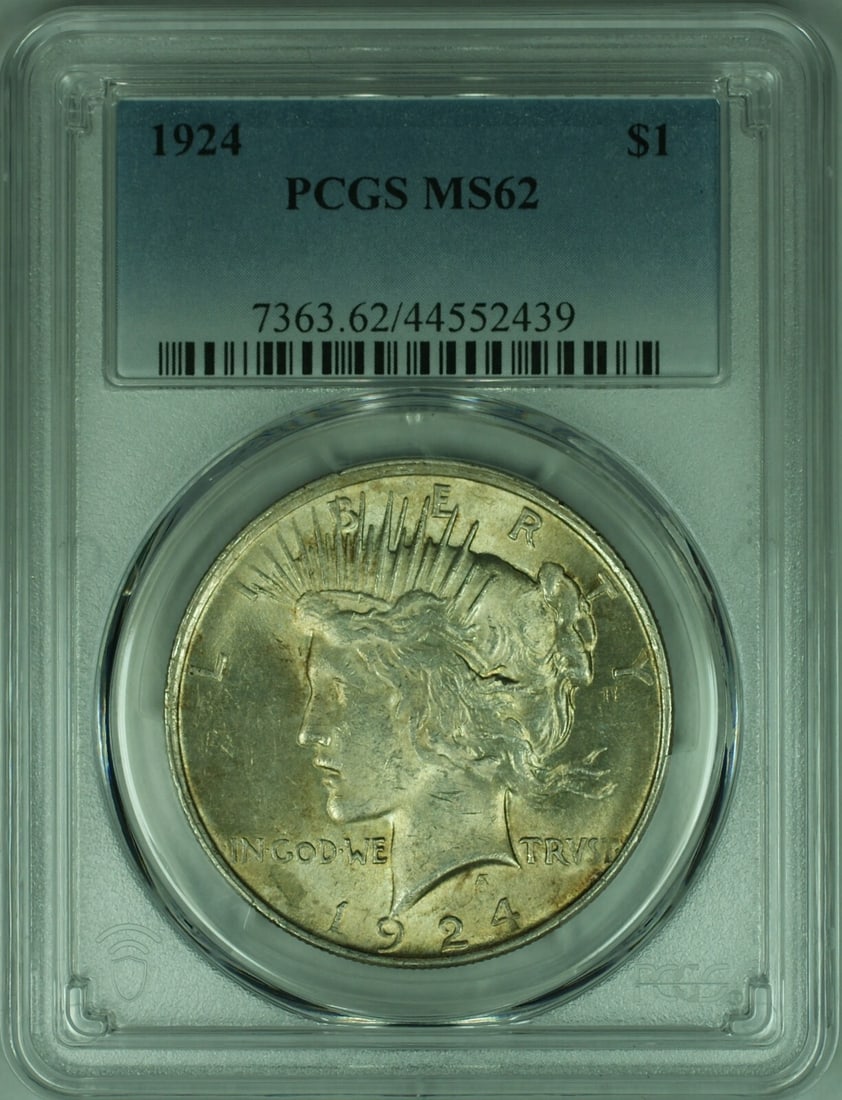 PCGS MS-62 1924 Peace Dollar Silver Coin with Light Toning: PCGS MS-62 1924 Peace Dollar Silver Coin with Light Toning This 1924 Peace Silver Dollar is graded MS-62 by PCGS and features light toning. Minted in Philadelphia, it has a composition of 90% silver. 