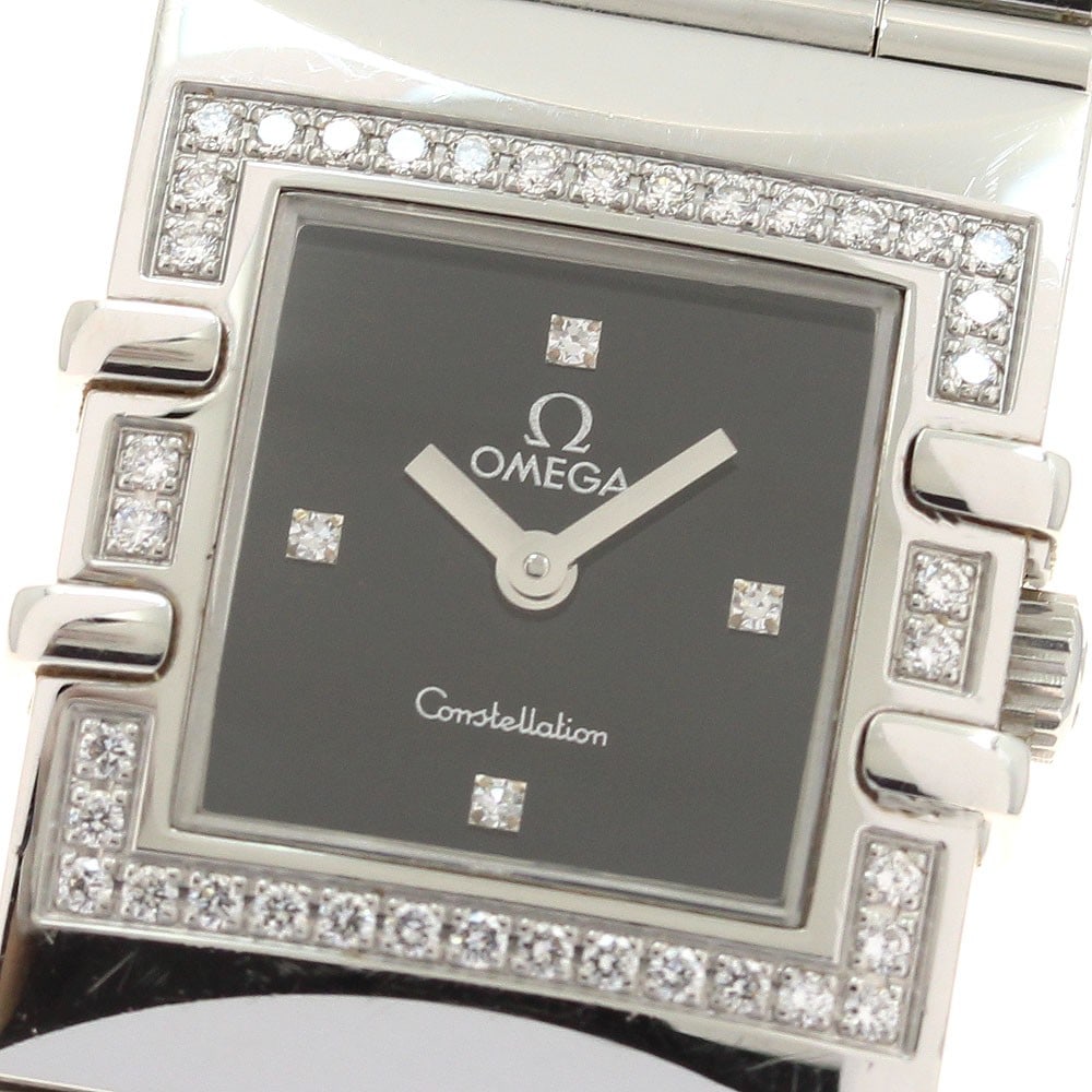 Omega Constellation Carre Quadra quartz ladies watch diamond bezel: Omega Constellation Carre Quadra quartz ladies watch diamond bezel This OMEGA Constellation Carre Quadra wristwatch is designed for women and features a stainless steel case and bracelet. The watch is