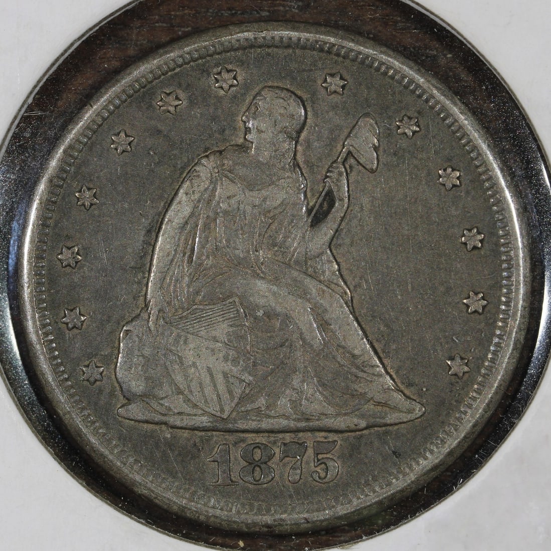 1875 Carson City 20C Silver Coin XF Uncertified: 1875 Carson City 20C Silver Coin XF Uncertified An 1875 Carson City 20 Cent Piece in XF condition. This United States coin is composed of silver with 0.9 fineness and is listed as circulated and uncer
