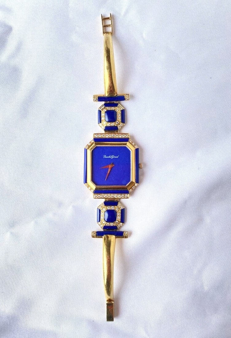 Bueche Girod 18K Gold Diamond Lapis Lazuli Mechanical Lady's Watch: Bueche Girod 18K Gold Diamond Lapis Lazuli Mechanical Lady's Watch This exquisite Bueche Girod mechanical lady's wristwatch is crafted from 18K yellow gold and features a stunning bezel adorned with a