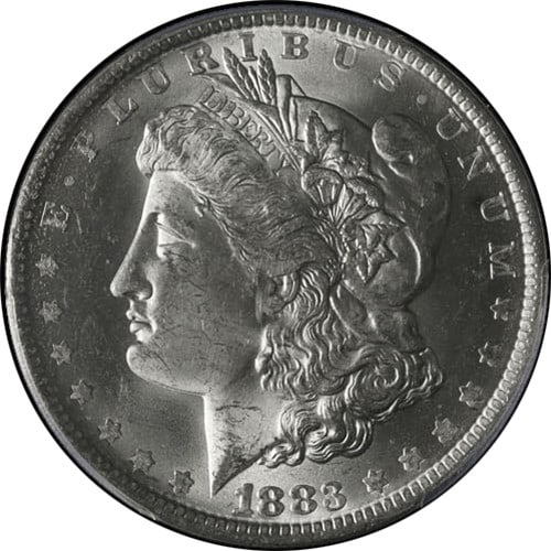 PCGS MS63 1883 O Morgan silver dollar blazing white: PCGS MS63 1883 O Morgan silver dollar blazing white This 1883-O Morgan Silver Dollar is certified by PCGS with a grade of MS63, indicating it is uncirculated and in excellent condition. The coin featu