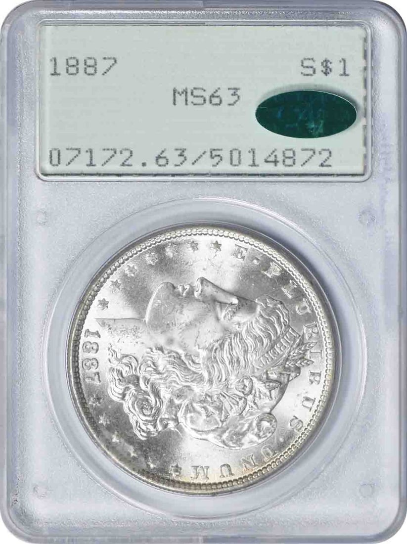 PCGS MS63 1887 Morgan Silver Dollar CAC OGH: PCGS MS63 1887 Morgan Silver Dollar CAC OGH This 1887 Morgan Silver Dollar is graded MS63 by PCGS and comes in an Old Green Holder (OGH) with CAC approval. The coin is uncirculated and composed of sil