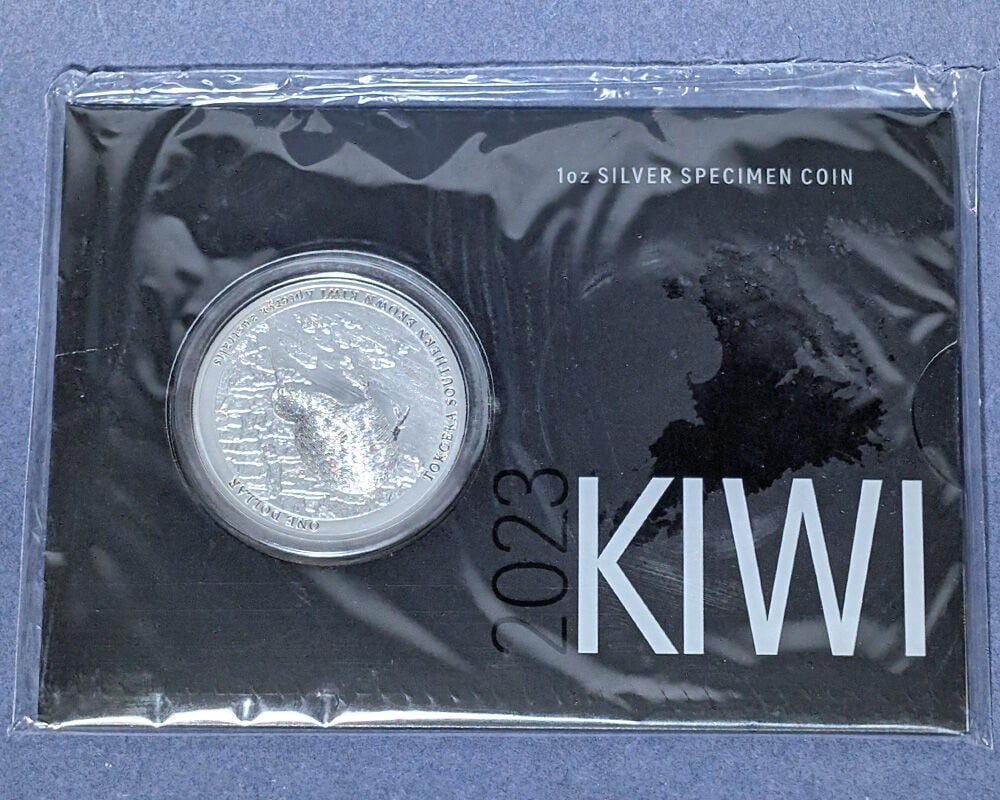 2023 New Zealand 1oz Silver $1 Kiwi Specimen Coin OGP: 2023 New Zealand 1oz Silver $1 Kiwi Specimen Coin OGP This 2023 New Zealand 1 Ounce Silver $1 Kiwi Specimen Coin showcases remarkable eye appeal, featuring impressive luster and a strong strike. The c