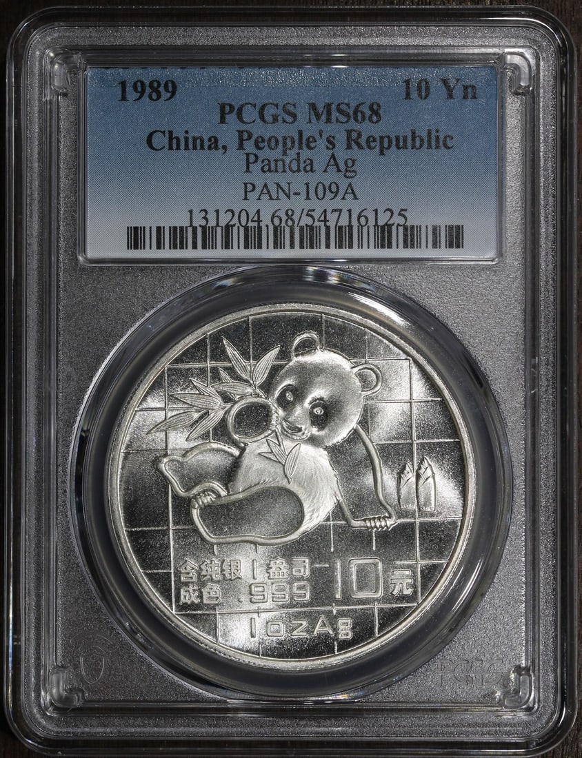 PCGS MS68 1989 China Silver Panda 1 oz Coin: PCGS MS68 1989 China Silver Panda 1 oz Coin 1989 Chinese Panda silver coin graded MS 68 by PCGS. This pre-owned coin contains 1 oz of 0.999 fine silver and was minted in China. Specifications Coin: Ch