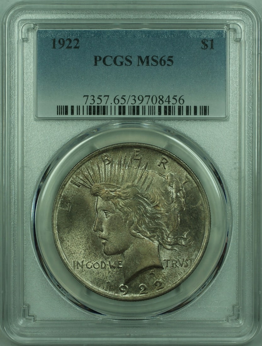 PCGS MS65 1922 Peace Dollar Silver Coin with Toning: PCGS MS65 1922 Peace Dollar Silver Coin with Toning This is a 1922 Peace Silver Dollar $1 coin, certified by PCGS with a grade of MS-65. The coin is uncirculated and features attractive toning. It was