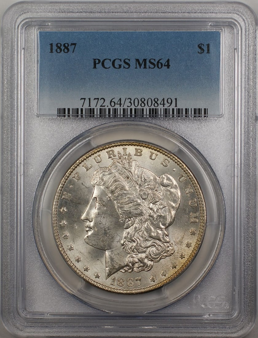 PCGS MS-64 1887 Morgan Dollar Silver Coin With Rim Toning: PCGS MS-64 1887 Morgan Dollar Silver Coin With Rim Toning This 1887 Morgan Silver Dollar features a rim-toned finish and has been certified by PCGS with a grade of MS 64. Struck in Philadelphia from s