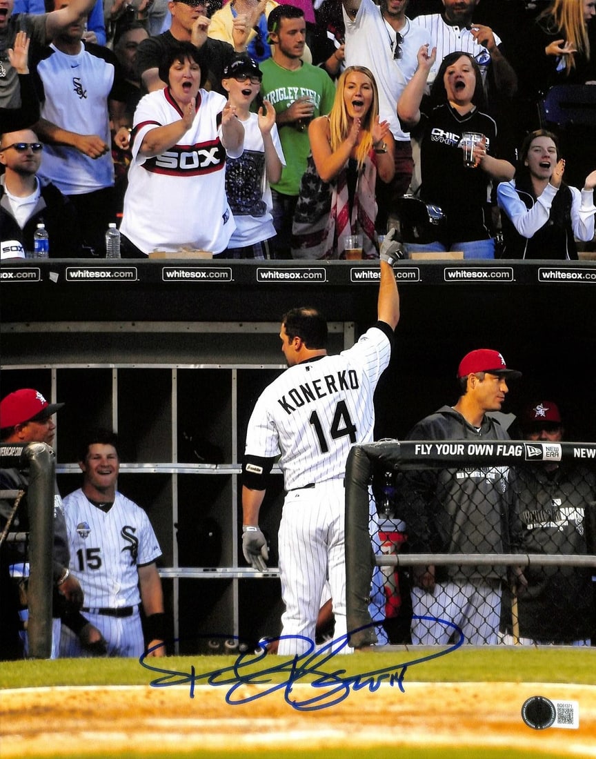 Beckett authenticated Paul Konerko signed 11x14 White Sox photo: Beckett authenticated Paul Konerko signed 11x14 White Sox photo This 11x14 photograph features Chicago White Sox legend Paul Konerko and is hand-signed by him. The photo captures a memorable moment of