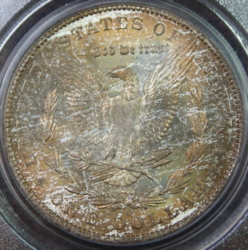 PCGS MS64 1902-O Morgan Dollar with Vibrant Toning New Orleans Mint: PCGS MS64 1902-O Morgan Dollar with Vibrant Toning New Orleans Mint This 1902-O Morgan Silver Dollar was minted in New Orleans and is certified by PCGS with a grade of MS-64. The coin features beautif