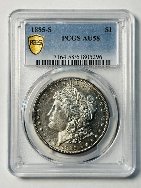 1885-S Morgan Silver Dollar PCGS AU58 DMPL Reverse: 1885-S Morgan Silver Dollar PCGS AU58 DMPL Reverse This 1885 Morgan Silver Dollar was minted in San Francisco and is graded AU-58 by PCGS. The coin is composed of silver and features a DMPL reverse. I