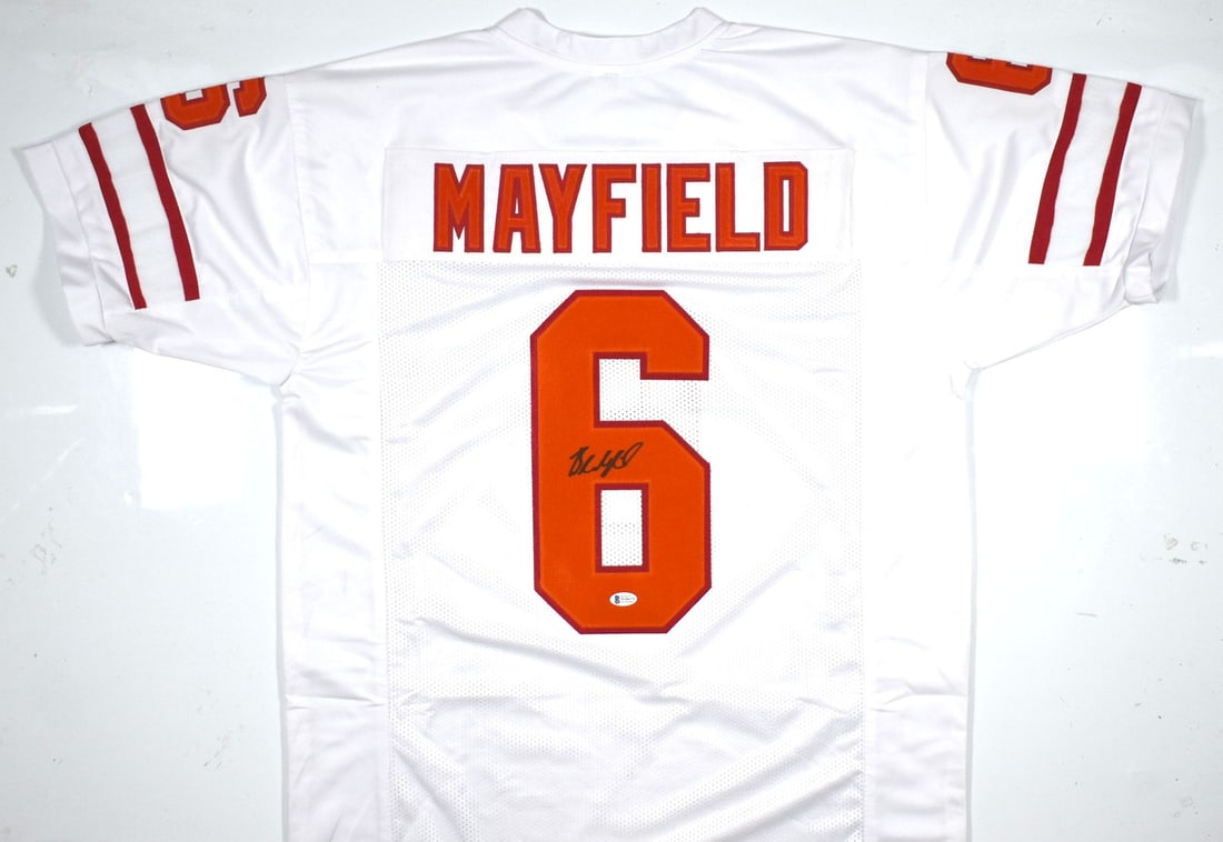 Beckett Certified Baker Mayfield Signed Buccaneers White Football Jersey: Beckett Certified Baker Mayfield Signed Buccaneers White Football Jersey Autographed white pro style football jersey featuring Baker Mayfield. The jersey is an original, pre-owned item associated with
